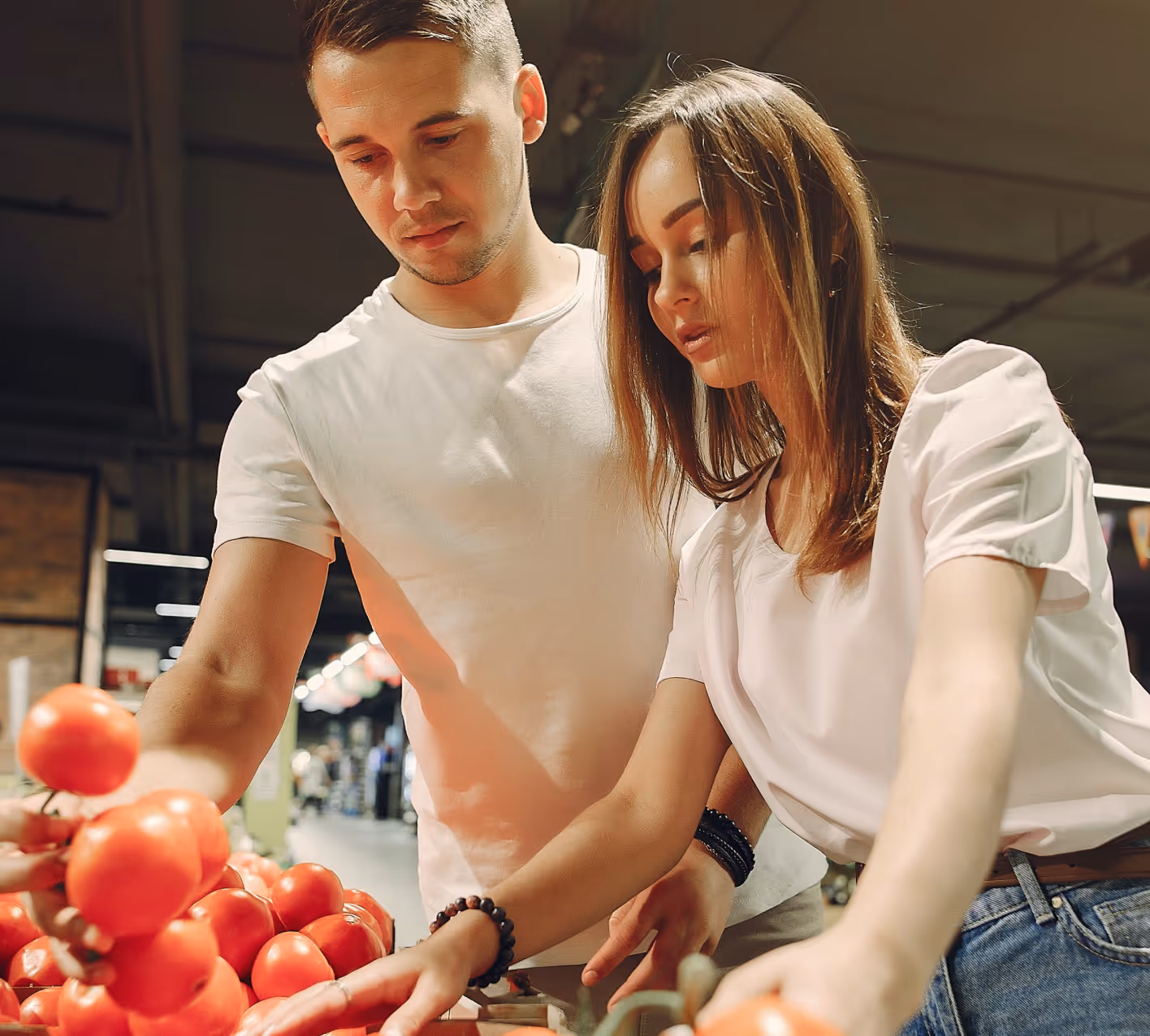 Two people in the grocery store